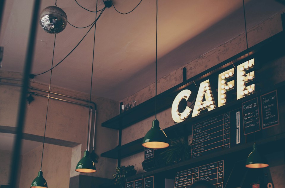 A neighborhood café with its storefront sign